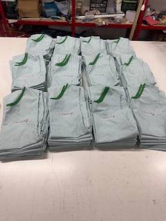 Confection de chasubles avec fermetures pressions sans poche pour une cooperative agricole à Saint-Just, dans l'Hérault