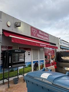 confection d'une bâche sur mesure extérieure et broderie personnalisée pour la boucherie Aimarguoise à Aimargues dans le Gard